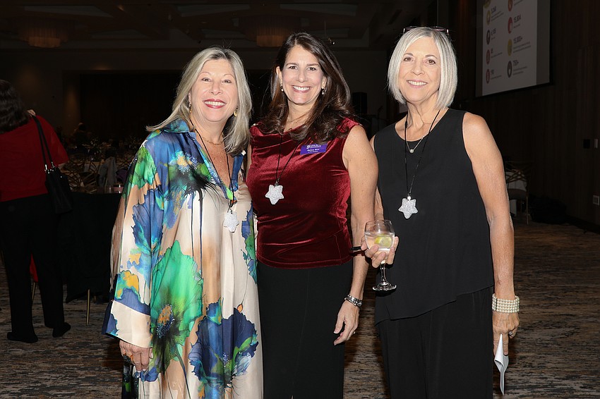 SPARCC Holiday Luncheon co-chairs Carolyn Castro, Melissa Silva and Allyson Galuska.