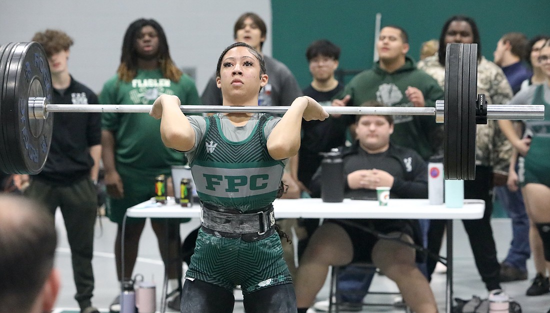 Nya Williams cleans 165 pounds at a Dec. 4, 2024 meet. She won two Five Star Conference titles on Dec. 17, 2025 with a 190-pound clean and jerk and 145 pounds in the bench press and snatch. File photo by Brent Woronoff