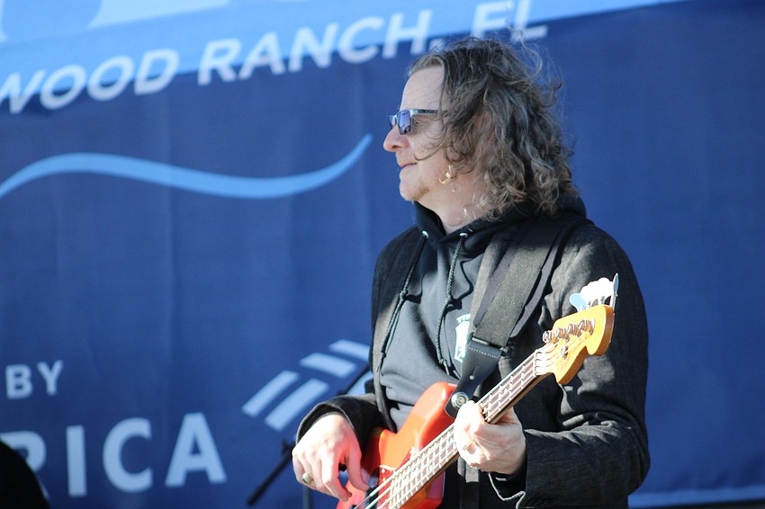 Guitarist Gary Davenport accompanies Melody Angels during the first set of the Lakewood Ranch Blues Festival.