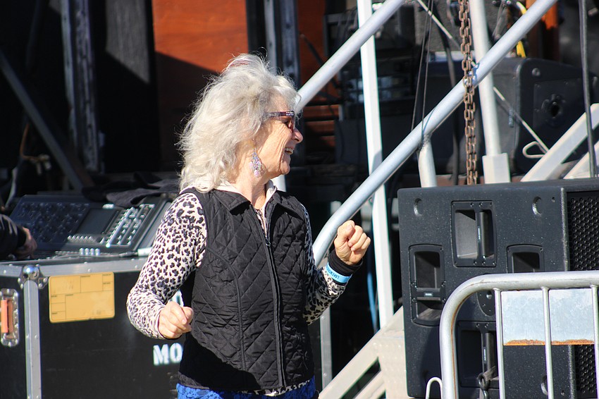 St. Petersburg's Ellen Brown dances nonstop near the stage during the Lakewood Ranch Blues Festival.