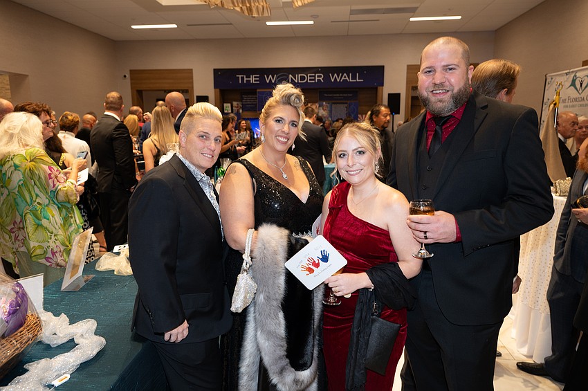 Angie and Meghan DeLong with Arianne and Kevin Robins