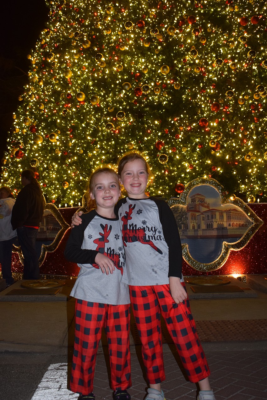 Arabella and Sadie Turner wore matching pajamas to the St. Armand Holiday Night of Lights.