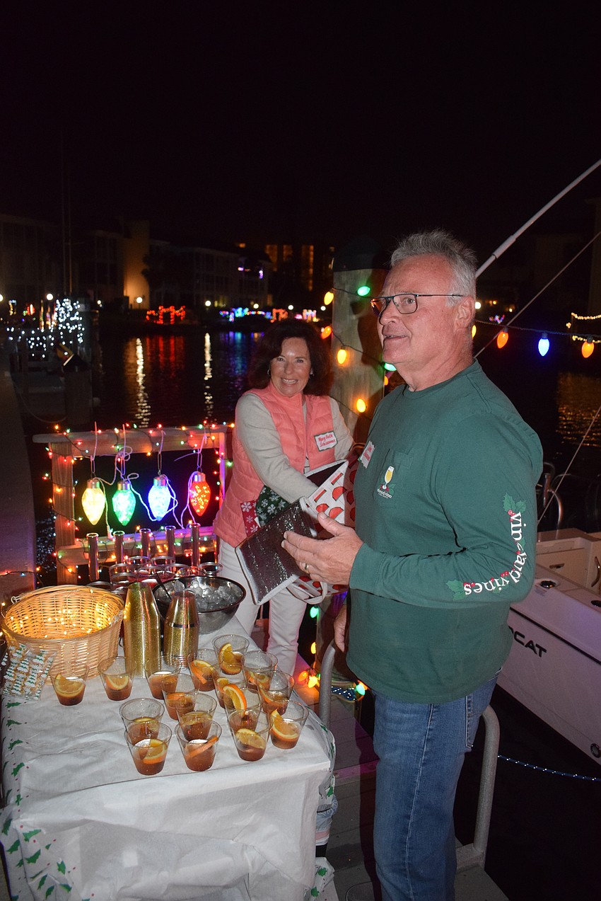 Mary Beth John Schiavone handed Whiskey Sours and 