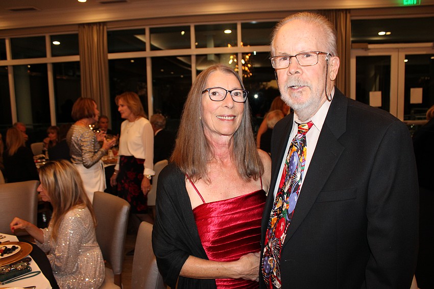 River Club's Dave and Nancy Rocks say they love visiting with neighbors and dancing at the Rockin' Reindeer Ball.