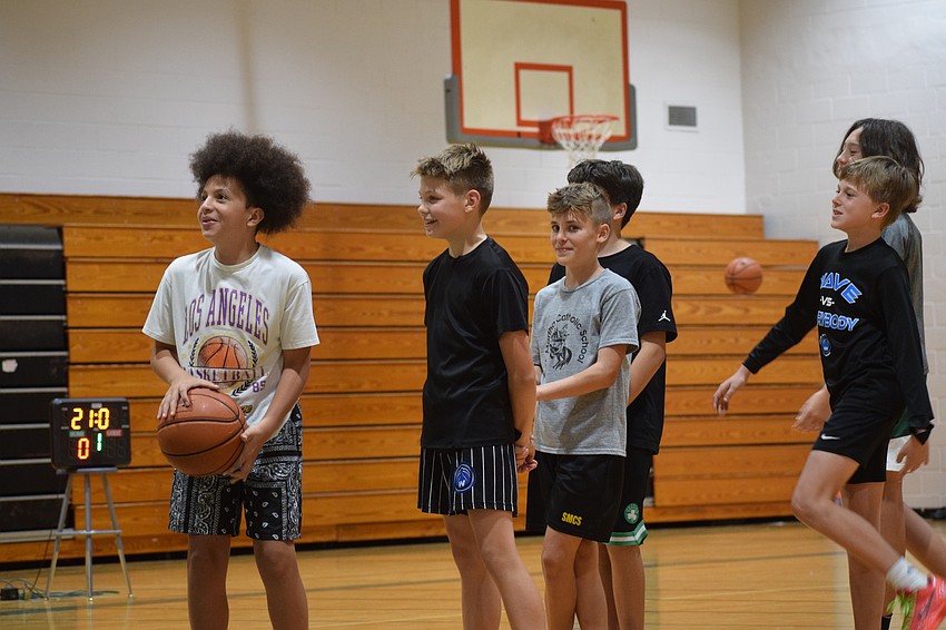 Trey McGee takes a moment to collect himself before attempting a free throw during the Lakewood Ranch-Sarasota Elks Hoop Shoot at Carlos E. Haile Middle School on Monday, Dec. 9.