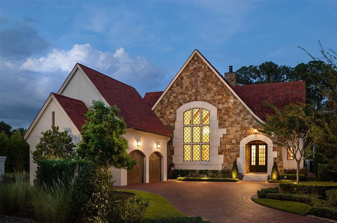 The home at 10077 Golden Touch Way, Golden Oak, sold Dec. 3, for $6 million. A distinctive French roofline and an opulent front window grace the façade of this European cottage. The sellers were represented by Gregory Foxx, Golden Oak Realty.