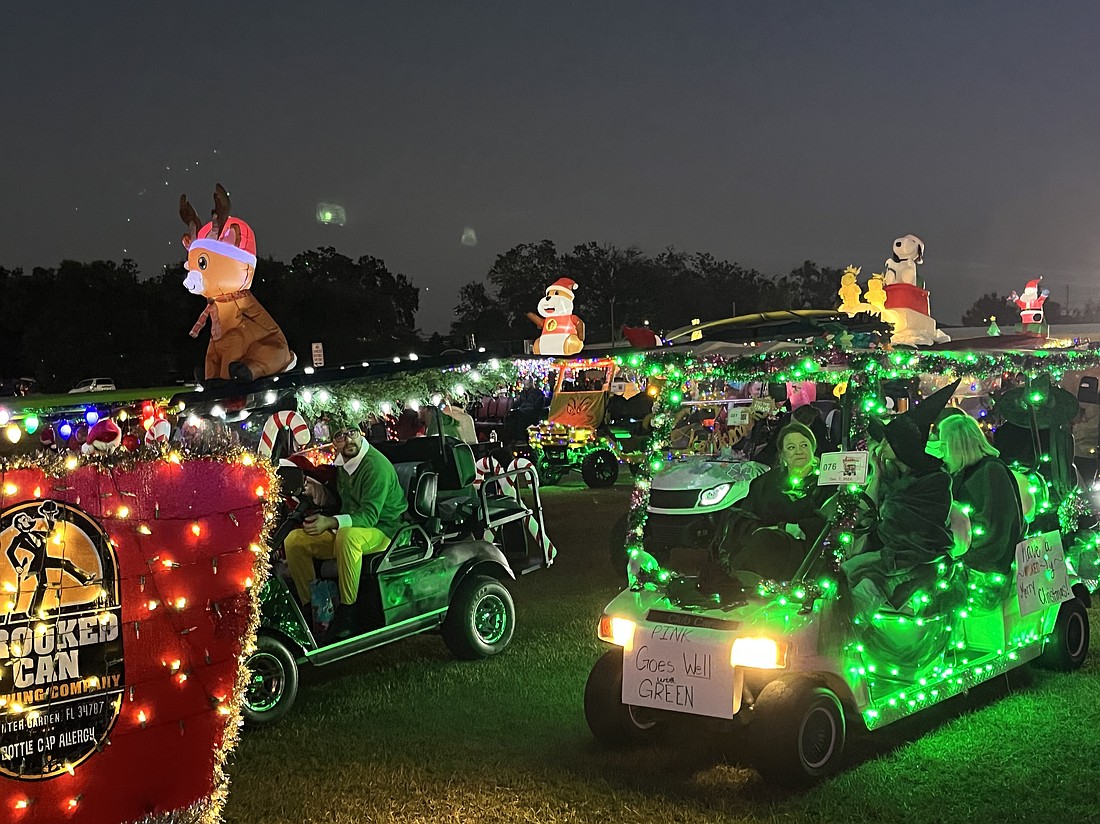 Decorated golf carts were lined up and ready to participate in the annual parade through downtown Winter Garden.