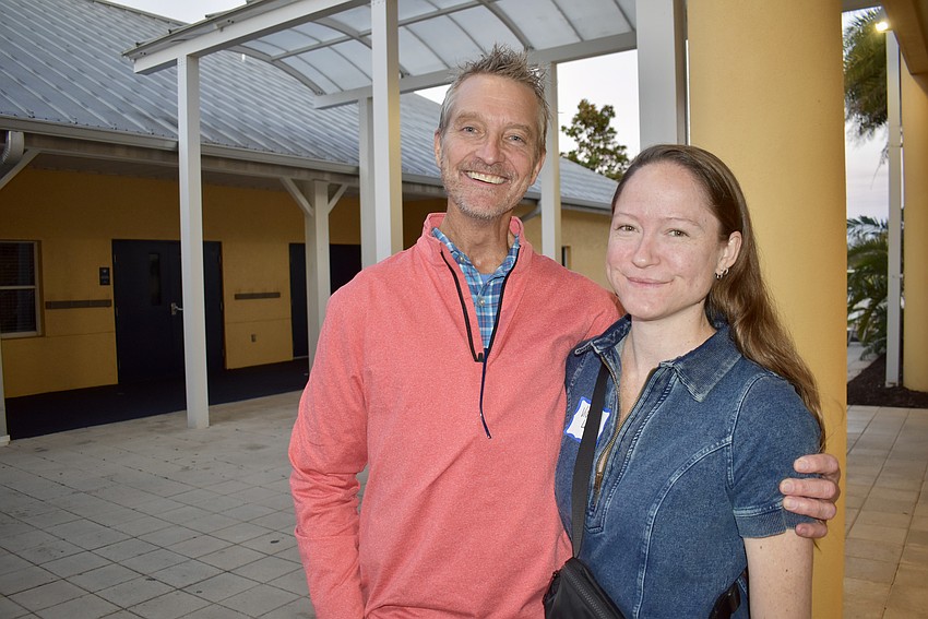 Biology teacher Mike Newhams stands with Violette Levy. What Newhams remembers most about Owen Han is that he was kind.