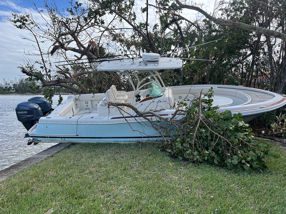 One of the boats that was moved from its lift near Lands End on the north end.