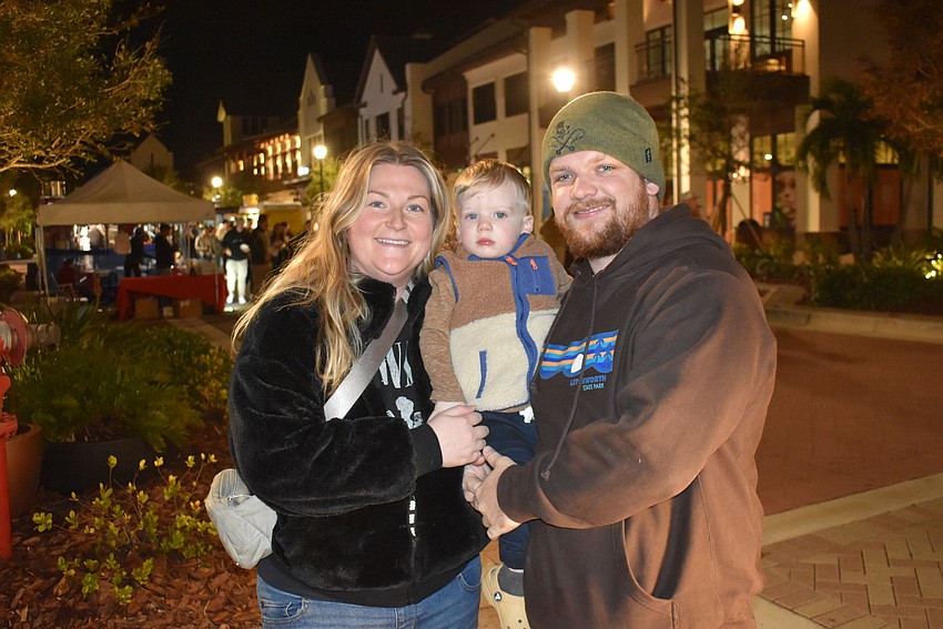 Waterside's Joan, Connor and Nick Salerno stop by Ranch Nite Wednesday for a photo with Santa for the baby and a drink for the grownups.