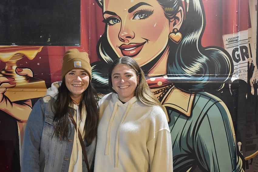 Sarasota's Nikole Kennedy and Sam Andrea stop at the Say Cheese food truck.