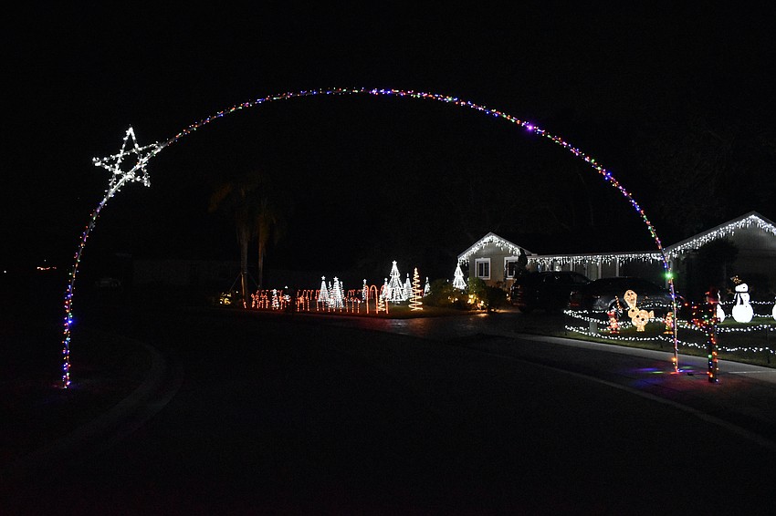An arch stretches above 3430 Spainwood Drive in Colonial Oaks.