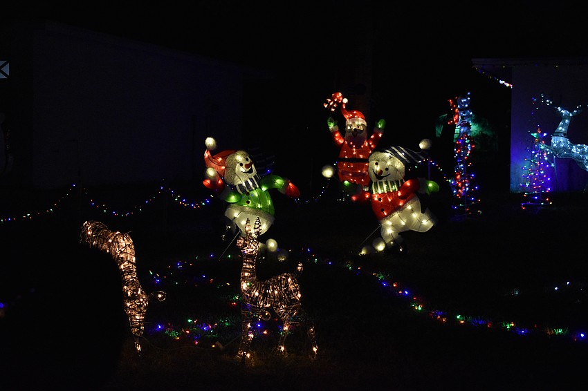 Snowmen and Santa dance together at 3722 Kingswood Dr. in Colonial Oaks.