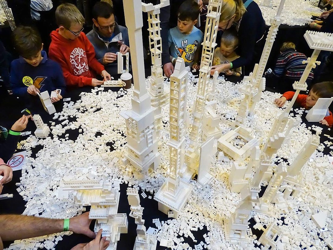 Attendees get busy in a Lego building zone.