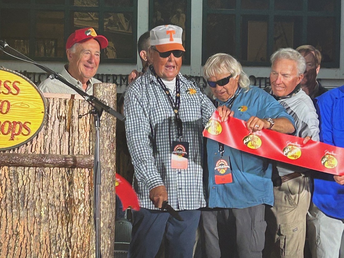 The ribbon-cutting at the opening of Bass Pro Shops in St. Augustine on Nov. 20. From left, Bass Pro founder Johnny Morris and celebrity fishing legends Bill Dance, Jimmy Houston and Roland Martin.
