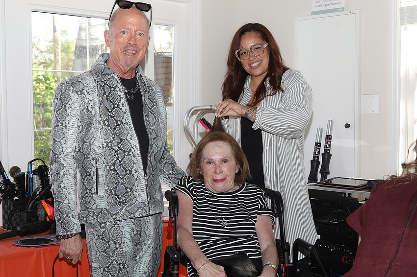 Ready for the runway: Terry McKee supports his friend Lois Geller as she receives a new 'do' and some makeup touches from Ciara Monet.