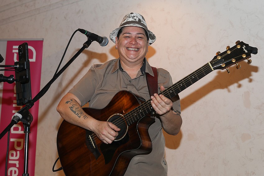 Musician Bri Rivera entertains during the Rise & Shine Brunch.