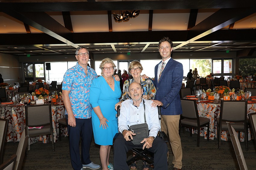 Bruce and Lila Levy are photographed with the Bryan family: Barb, Bill and their son, Brad.