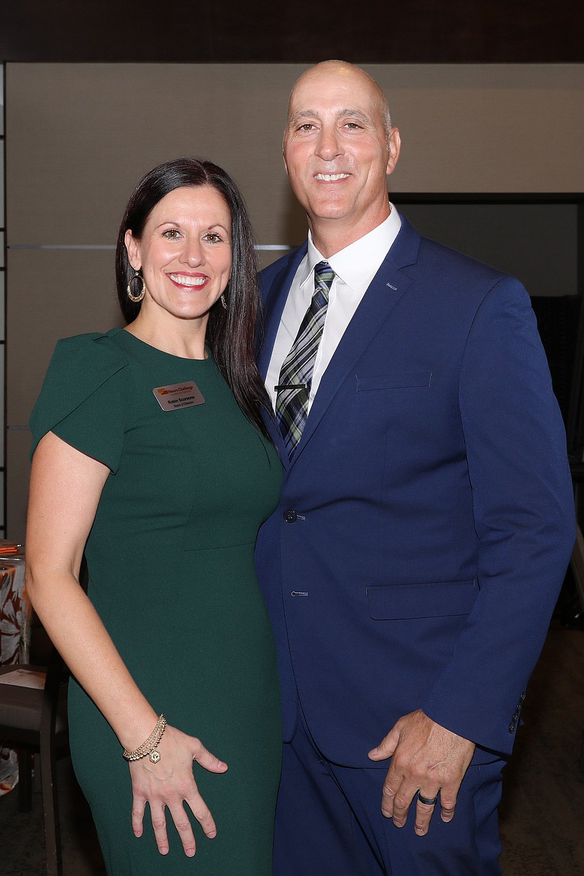 Cause 4 Fashion keynote speaker Robin Scorsone and husband, Frank