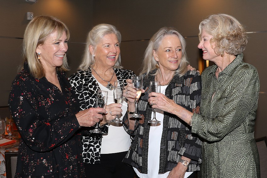 Mary Lee Bischoff, Diane Green, Cathy Loehlrer and Jane Hamlin toast to Cause 4 Fashion.