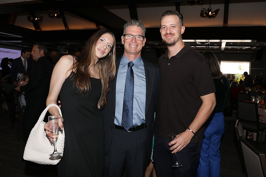 Devon Sutherland and her fiancée Matthew Dinneny with Devon's dad, Dr. Dean Sutherland (C)
