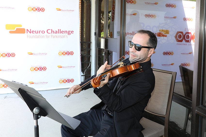 Yordan Tenev performs during the VIP champagne cocktail reception.