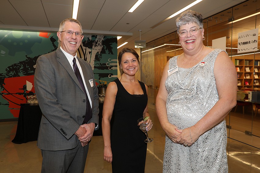Brad Patton with Director of Library Services Bianca Prather-Jones and Ginger Patton