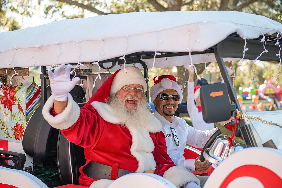 Santa Claus waved at parade-goers during the event.