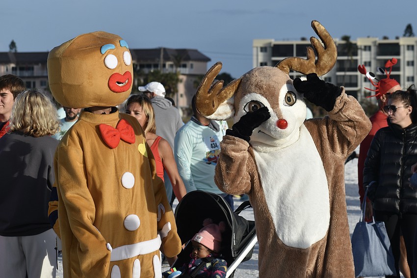 Greg Steinberg and Mitch Andress observer the action.