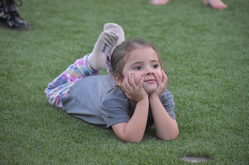 Everlee Downey, 3, watches a dance instructor.