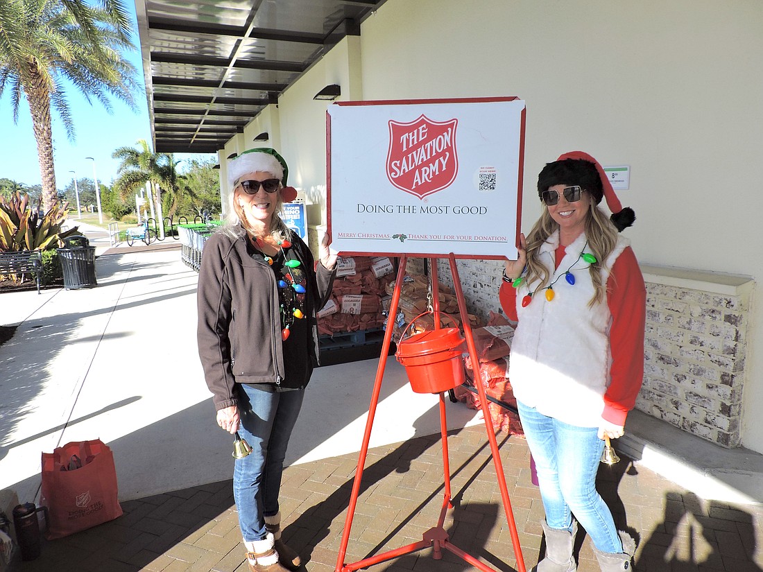 Bonnie Staley and Shannon Ford donate their time to collect funds for The Salvation Army outside the Publix at Lorraine Road and University Parkway.