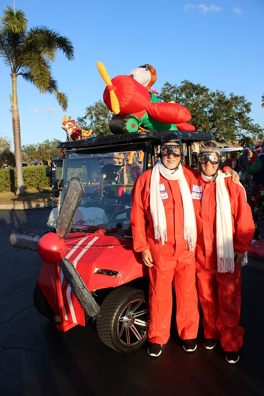 Robert and Jane Otain always have loved Snoopy so they became World War I flying aces for the parade.