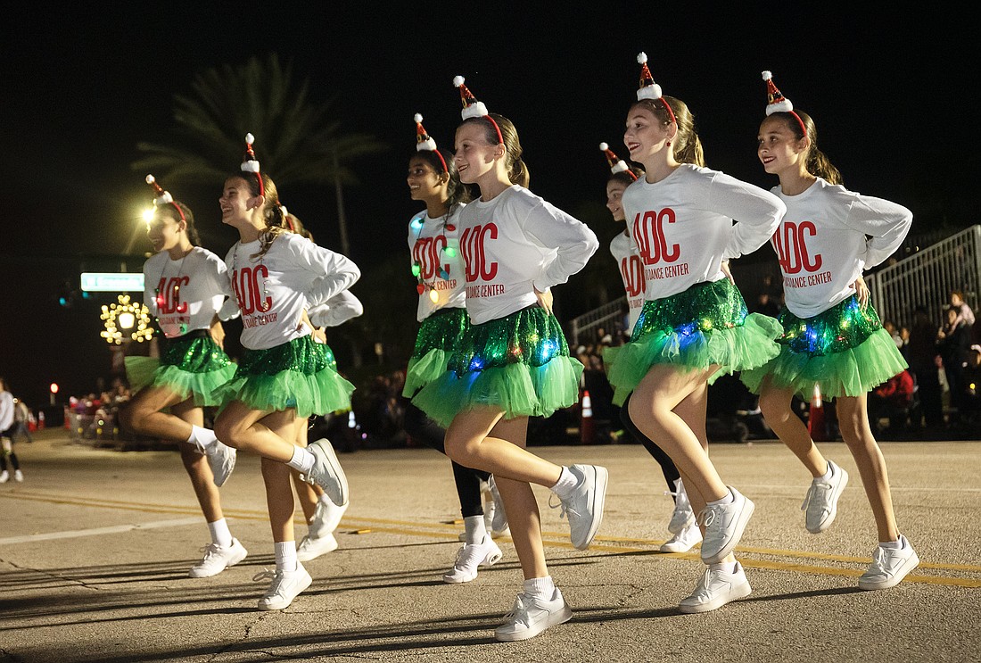 Amanda's Dance Center dancers perform for the judges at the Home for the Holidays parade on Saturday, Dec. 14. Photo by Michele Meyers