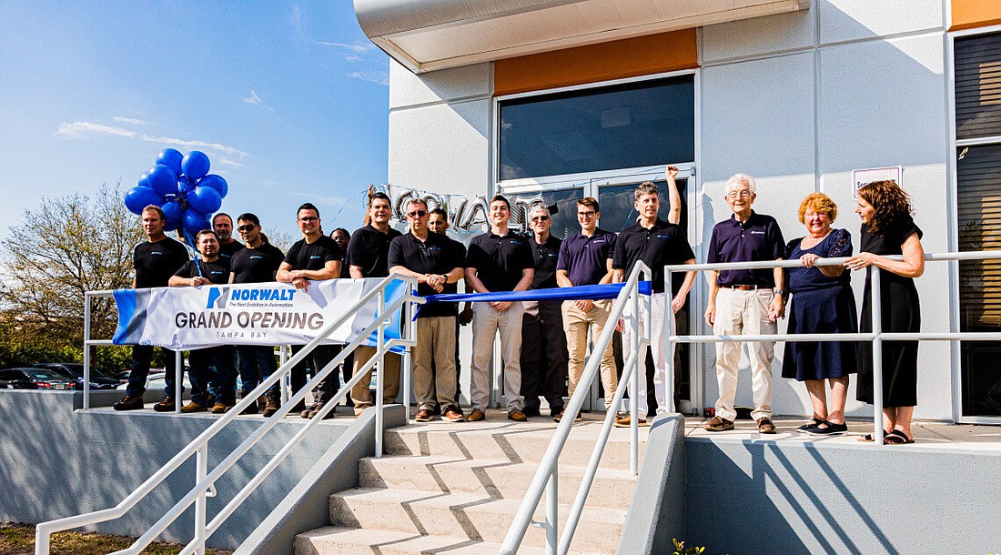 Norwalt staff celebrates its grand opening in Tampa.