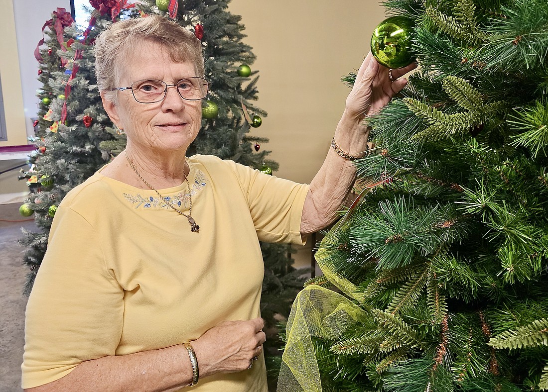 Christmas Come True volunteer Karen Shoemaker says volunteering is just another way she helps her neighbors. Photo by Sierra Williams