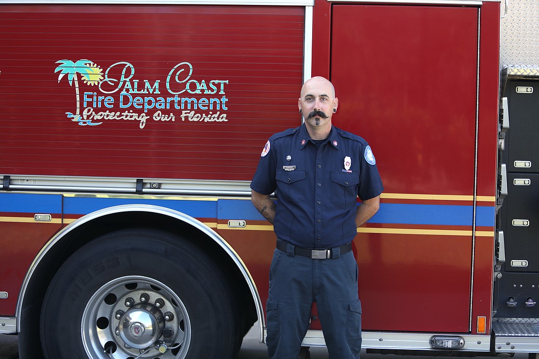 Chris Cottle has been a full-time firefighter with the Palm Coast Fire Department since 2004 and the department's chaplain since 2019. Photo by Brent Woronoff