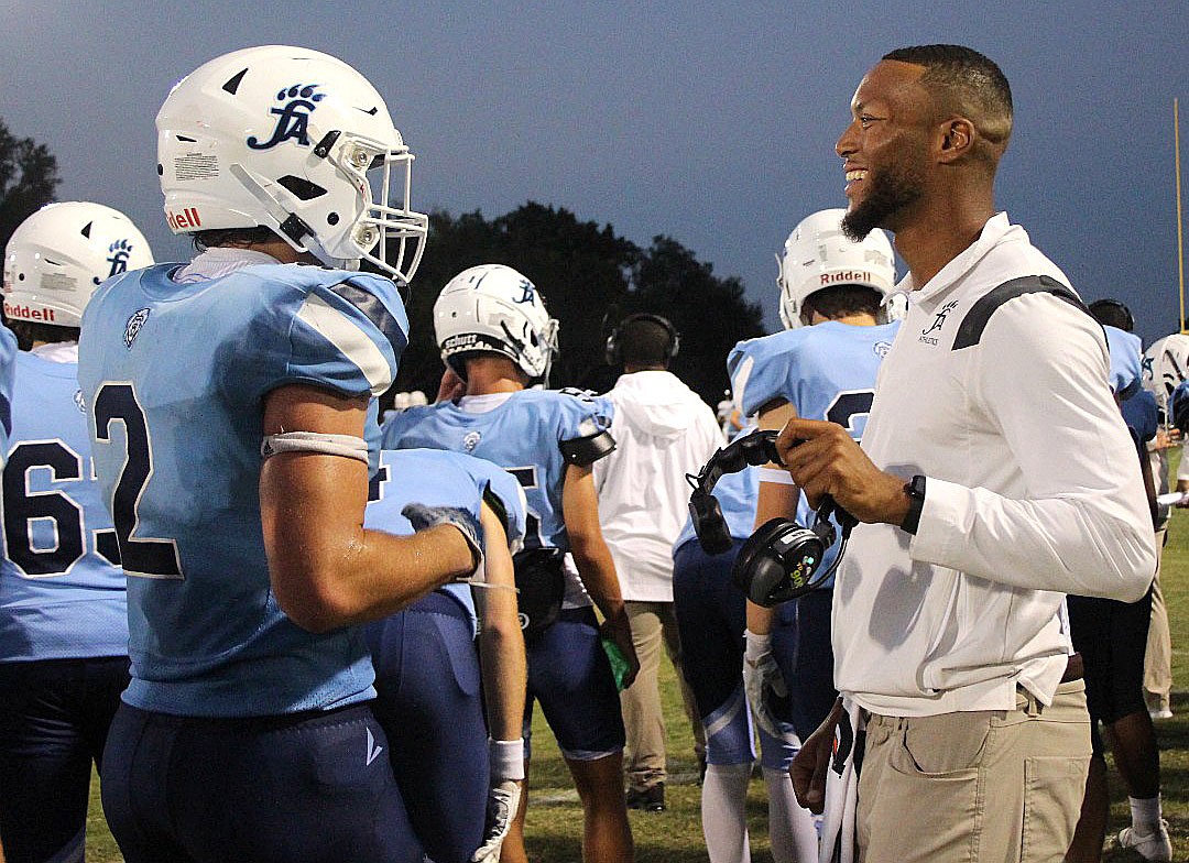 Denzel Irvin, right, was a beloved Foundation Academy coach and alumnus.