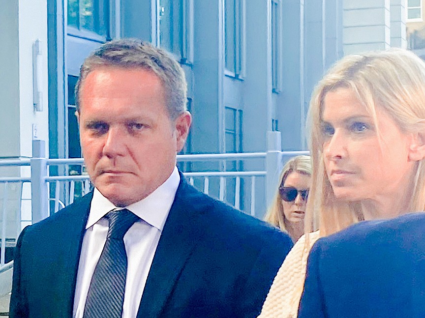 Convicted former JEA CEO Aaron Zahn leaves the Bryan Simpson U.S. Courthouse with his wife, Mary Branan Ennis Zahn, after being sentenced July 30 to four years in prison for wire fraud and conspiracy in the abandoned sale of the city-owned utility.