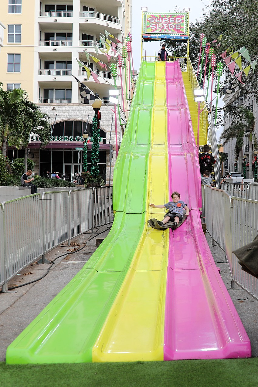 Isaac Skinner braved the 30-foot high Super Slide at the downtown New Year's Eve celebration.