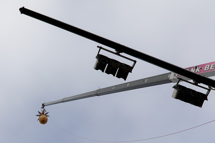 The pineapple is stored during the 364 days off season in a secret location near 12th street, weighs a couple of hundred pounds, has a thousand lights, and is carefully moved around on a fork lift.