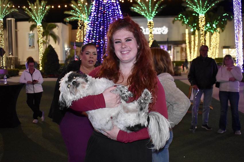 East County's Tay Johnson holds 11-year-old Sully.