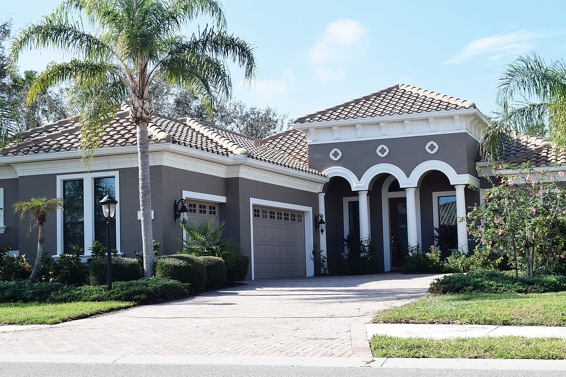 This Country Club home at 7258 Lake Forest Glen sold for $875,000. Built in 2013, it has three bedrooms, three baths, a pool and 2,496 square feet of living area.