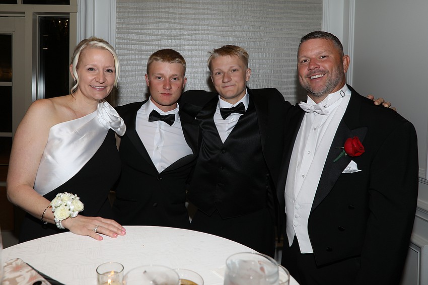 Debutante parents Jessica and Craig Jackson with sons Lance and Hunter.