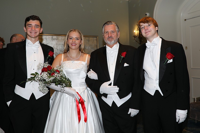 Sienna Steiner and dad David with her debutante escorts Henry Shoemaker and Eli Juckett-Malone