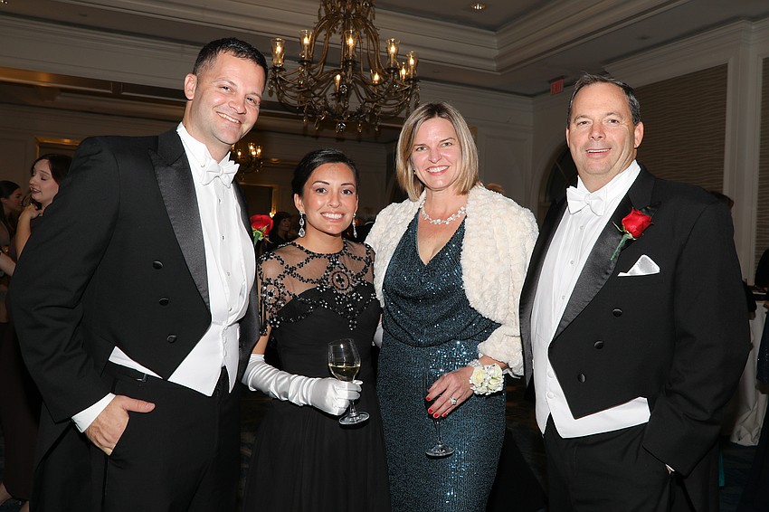 Debutante parents Ben and Cori Rigney and Rebecca and John Neal.