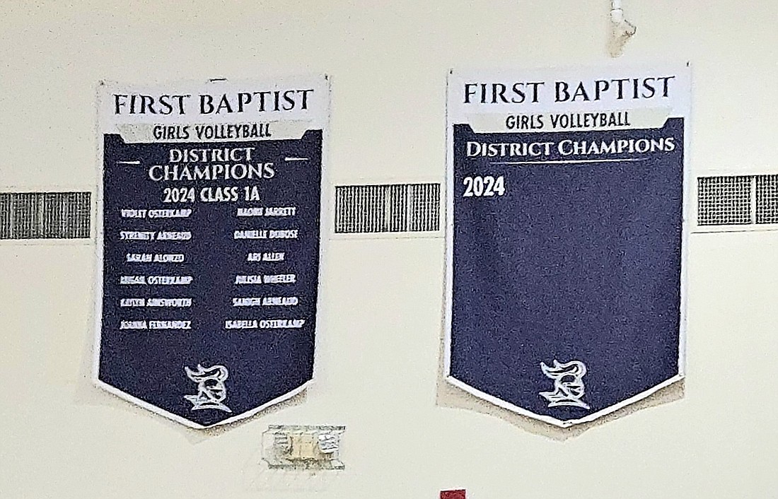 First Baptist Christian Academy unveiled banners honoring the Crusaders' first district volleyball championship. Courtesy photo from First Baptist Christian Academy