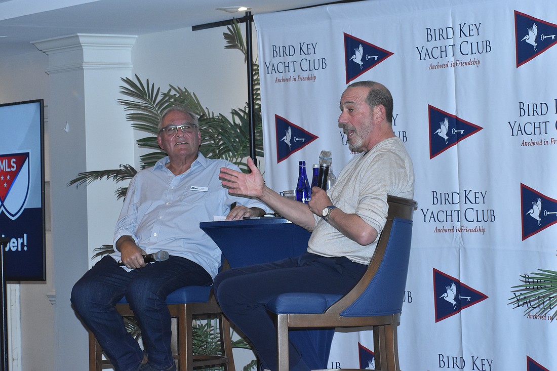 MLS Commissioner Don Garber (right) speaks at the Bird Key Yacht Club with Gene Goldberg (left). Garber owns a property on Lido Key and has been coming to the area for decades.