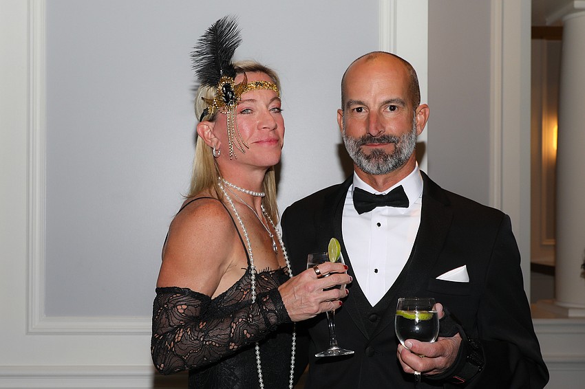Amy Budke and Trey Arias enjoying the 1920s' themed party.