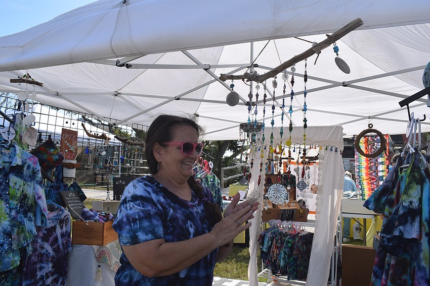 Debbie Lemieux makes homemade paper to sell at Market on the Key.