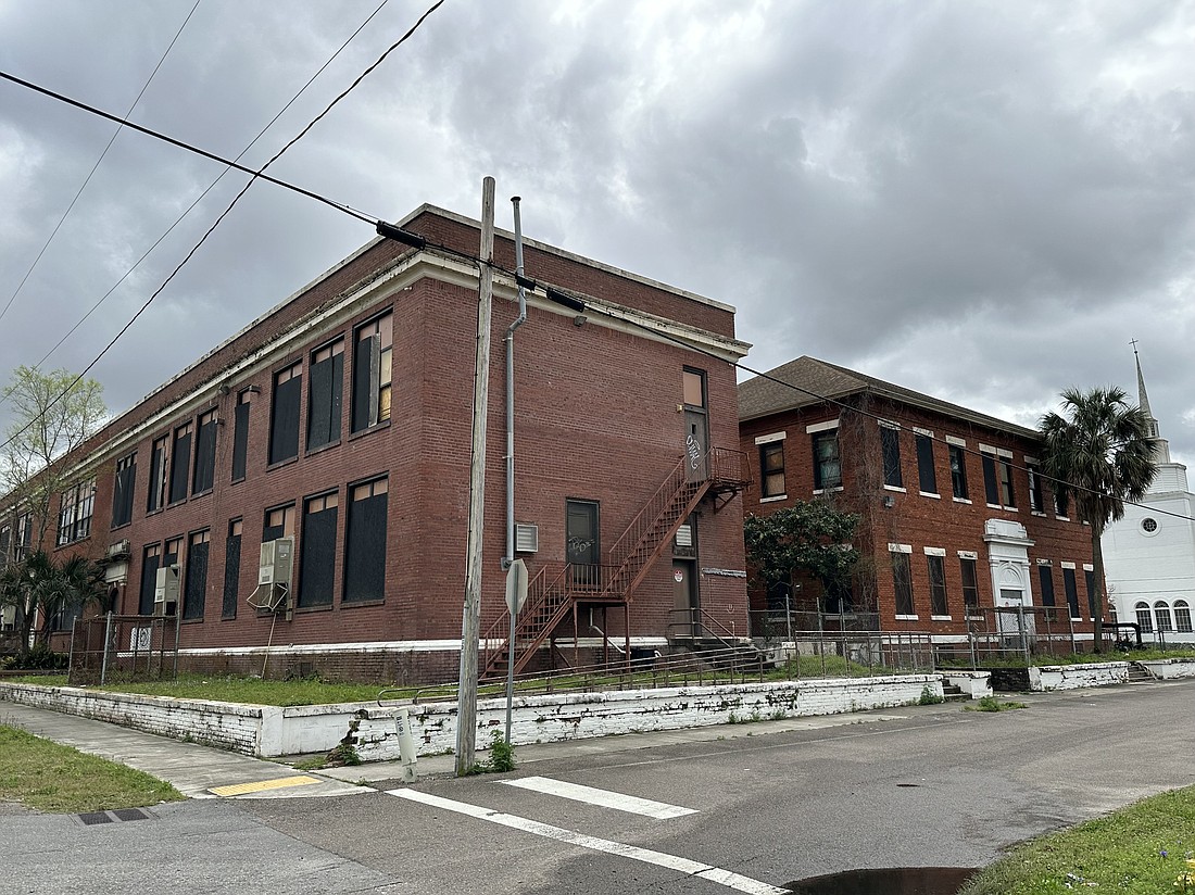 The vacant J. Allen Axson Elementary School at 1221 E. 16th St. could be turned into a restaurant, hotel and storage facility.